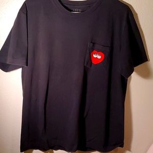 Black shirt with heart on pocket
